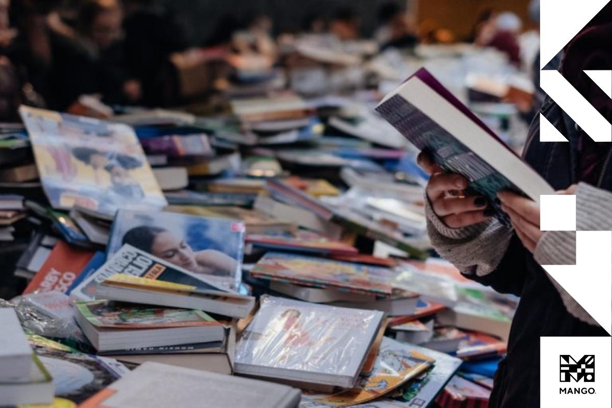 A huge pile of books on a street market booth