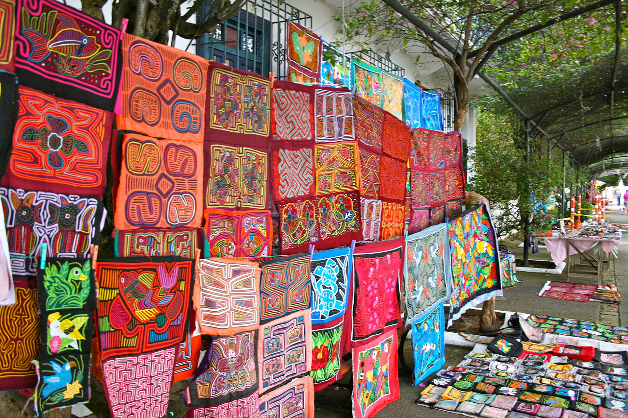 A picture of molas from Panama, a particular hand-sewn fabric which has extremely colorful patterns